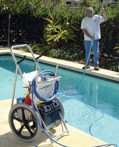 Technician cleaning a swimming pool